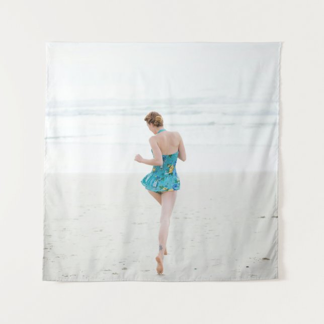 Woman walking on shore near beach tapestry (Front)