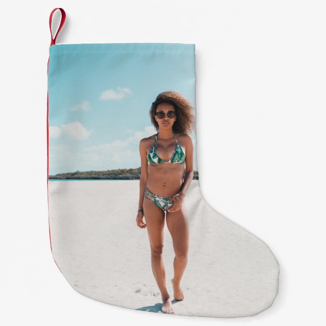 Woman wearing bikini standing on sand small christmas stocking (Front)