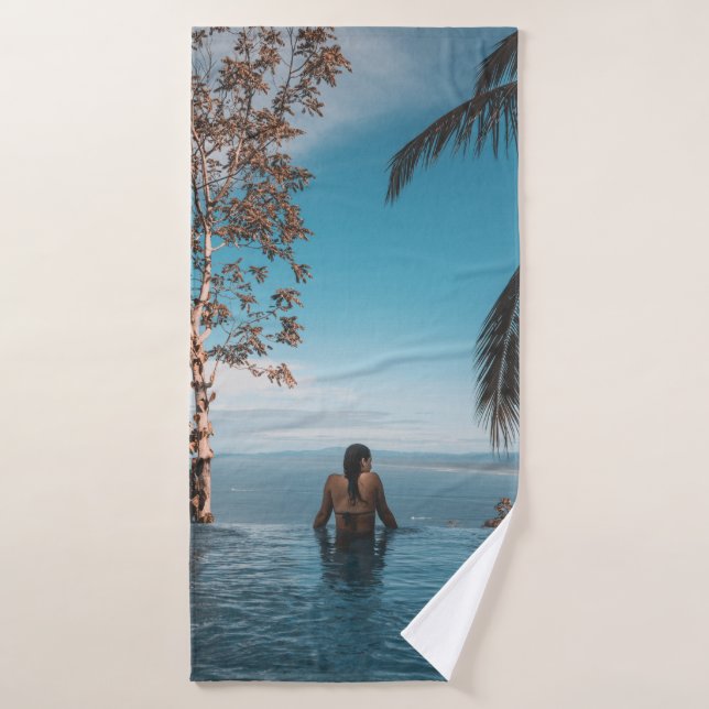 Woman wearing black bikini tap swimming on body of bath towel (Bath Towel)