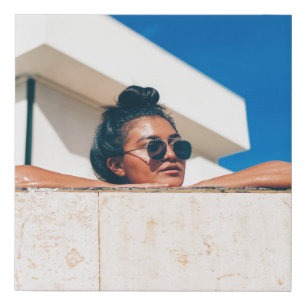 Woman wearing black sunglasses faux canvas print