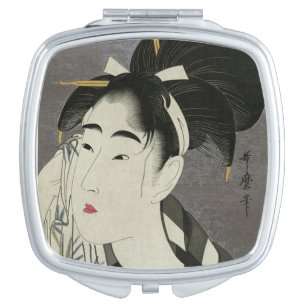 Woman Wiping Face Compact Mirror
