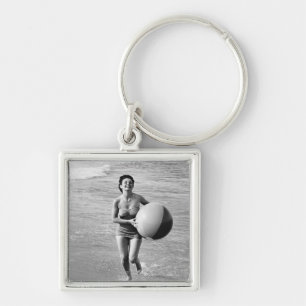 Woman with a Beach Ball Keychain