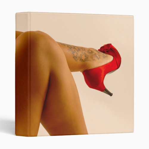 Womans Crossed Bare Legs with Red High Heels Binder