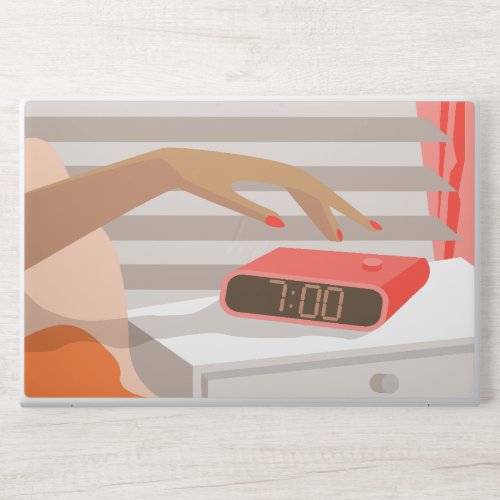 Womans hand pushing on alarm clock snooze button HP laptop skin