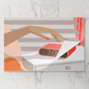 Womans hand pushing on alarm clock snooze button paper pad