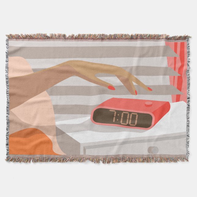 Womans hand pushing on alarm clock snooze button throw blanket (Front)