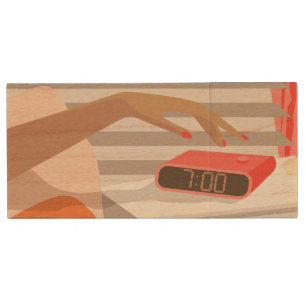 Womans hand pushing on alarm clock snooze button wood flash drive