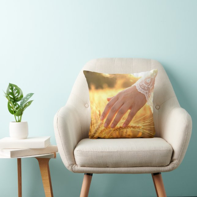 Woman's Hand Touching Wheat Tassels Throw Pillow (Chair)
