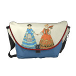 Women In Blue and Red Costumes Holding Hands Courier Bag at Zazzle