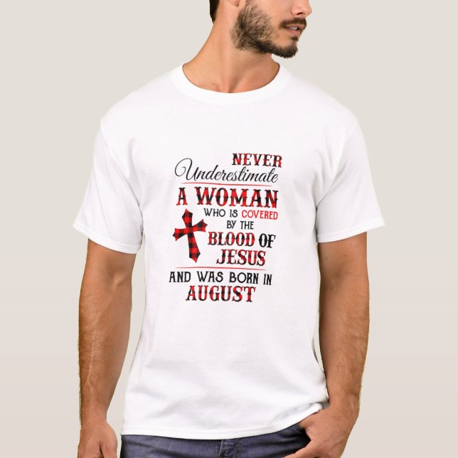 Womens A Woman Covered The Blood Of Jesus And Was T-Shirt (Front)