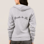 Women's Bride to Be Hoodie<br><div class="desc">This women's Bella soft front zip hoodie is for the bride to relax in,  shown in heather grey and has Bride to Be text on the back. 
Color Heather Grey  Text color Black
Customize this item or buy as is,  or add your name.</div>