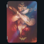 Wonder Woman Blocking With Bracelets iPad Air Cover<br><div class="desc">Check out Wonder Woman,  portrayed by Gal Gadot,  blocking with her Bracelets of Submission. This iconic movie poster for Wonder Woman shows her bracelets gleaming out of the dark and the firey dust around her.</div>