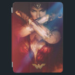 Wonder Woman Blocking With Bracelets iPad Air Cover<br><div class="desc">Check out Wonder Woman,  portrayed by Gal Gadot,  blocking with her Bracelets of Submission. This iconic movie poster for Wonder Woman shows her bracelets gleaming out of the dark and the firey dust around her.</div>