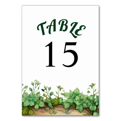 Wood and lovely greenery spring wedding table number