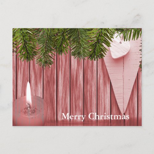 Wood background with candle and heart Christmas Holiday Postcard