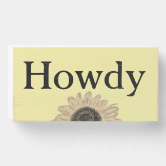 Wood box sign with Howdy greeting and sunflower
