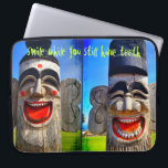 Wood Totum Smile While You Still Have Teeth Quote Laptop Sleeve<br><div class="desc">Who can resist laughing faces like these? Remember to “smile while you still have teeth” as you use this quirky, colorful carved, wooden character neoprene laptop sleeve. This laptop sleeve comes in three sizes: 15", 13", and 10”. Makes a great gift for someone special! You can easily personalize this neoprene...</div>