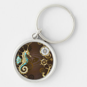 Wooden Background with Mechanical Seahorse Keychain
