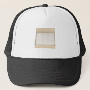 Wooden bed with memory foam mattress trucker hat