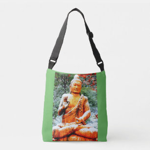 wooden buddha in snow crossbody bag