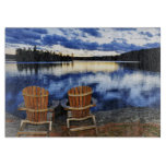 Wooden Chairs At Sunset On Lake Shore Cutting Board at Zazzle