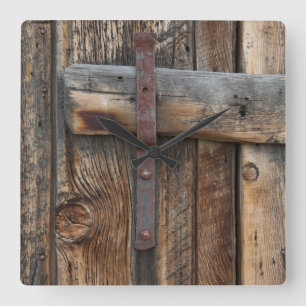 Wooden door close-up square wall clock