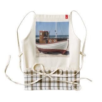 Wooden fishing boat on the beach. zazzle HEART apron