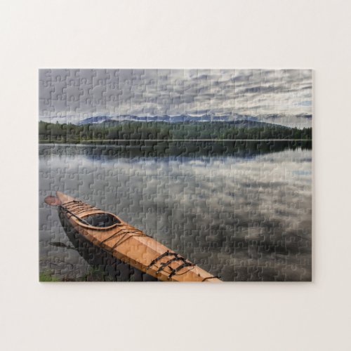 Wooden kayak on shore of Beaver Lake Jigsaw Puzzle
