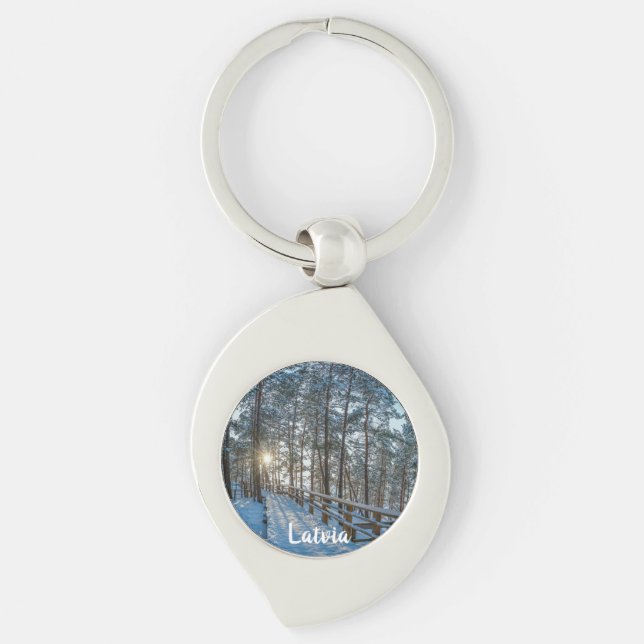 Wooden path across snowy winter forest keychain (Front)
