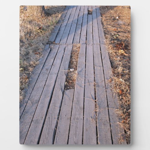 Wooden walkway made of planks plaque