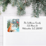 Woodland Fox Christmas Return Address Label<br><div class="desc">Add woodland charm to your holiday mail with this Christmas return address label featuring a watercolor fox and cardinal in a snowy evergreen forest. The design brings a rustic, nature-inspired touch to envelopes for Christmas cards, party invitations, or seasonal letters. Customize with your family name and address for a warm,...</div>
