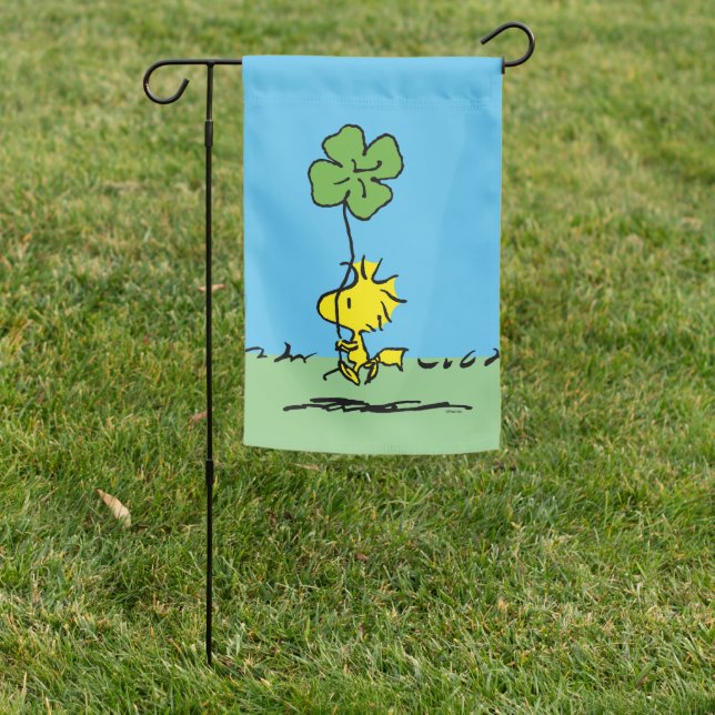 Woodstock Carrying Shamrock Garden Flag (In SItu)