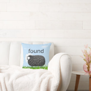 Wooly Black Sheep In Grass with "Found" Text Throw Pillow