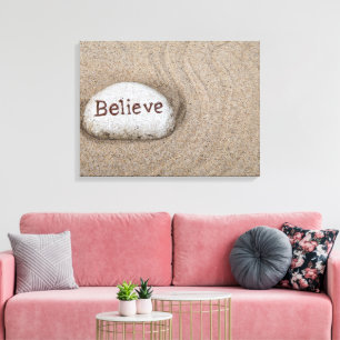 word Believe on beach rock Canvas Print