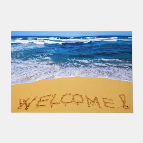 Word WELCOME Written on Sandy Beach Doormat