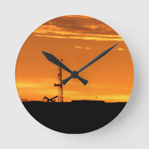 Workover Rig at Sunset Round Clock