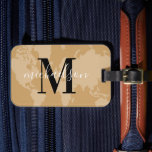 World Traveler Cognac Map Custom Monogram Name Lug Luggage Tag<br><div class="desc">Travel the world in style! This elegant and modern luggage tag features a cognac tan brown map of the world background with black and white custom monogram that can be personalized with your first or last name and initial letter.</div>