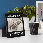 Worlds Best Cat Dad Black Square Custom Photo Plaque<br><div class="desc">This simple and modern square custom photo plaque easel sign features a portrait-shaped photo space with custom "The World's Best Cat Dad" wording with name(s) of pet kitty cat(s) in modern black style with cute paw prints, heart accent, and personalization of the cat's name. Makes a great Father's Day gift...</div>