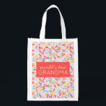 World's Best Grandma Vibrant Leaf Mosaic Coral Grocery Bag<br><div class="desc">Tell the grandmother in your life that she's the best with this vibrant leaf mosaic grocery bag in teal,  coral,  yellow and pink and the phrase "world's best grandma". Perfect for Mother's Day,  birthdays and more. Part of a collection from Parcel Studios.</div>