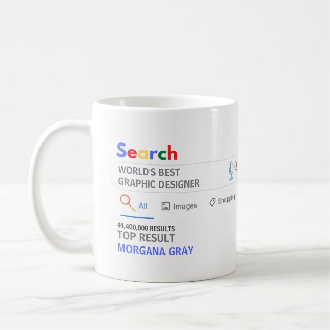 WORLDS BEST GRAPHIC DESIGNER FUN Top Search Result Coffee Mug (Left)