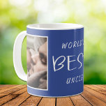 World's Best Uncle Photo Blue Coffee Mug<br><div class="desc">A fun gift for the world's best uncle! You can personalize one handle side of this blue mug with a photo (vertical will fit best). World's Best Uncle is written in modern white typography in the middle part of the mug. On the other handle side of the mug, one to...</div>