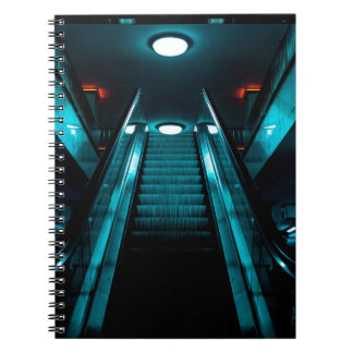 WORM'S EYE VIEW PHOTOGRAPHY OF GRAY BUILDING UNDER NOTEBOOK