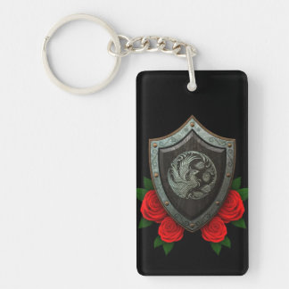 Worn Circular Phoenx Shield with Red Roses Keychain
