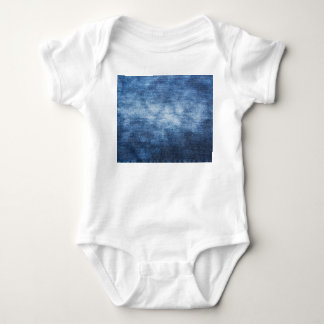 Worn denim fabric, textured background. baby bodysuit