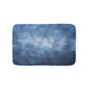 Worn denim fabric, textured background. bath mat