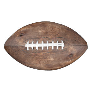 Worn pine board football