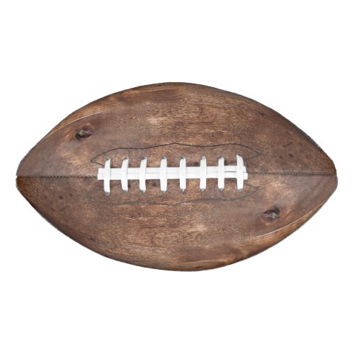 Worn pine board football