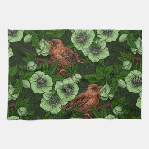 Wren and hellebore on dark green kitchen towel