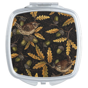 Wrens and acorns on black compact mirror