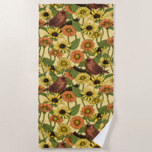 Wrens and flowers on pale yellow beach towel